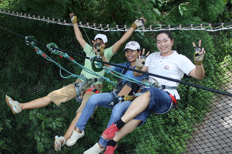 Treetop zip lining company outing